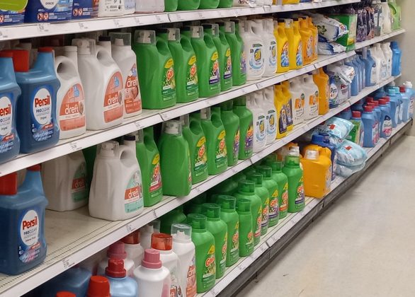 Persil detergent pacs and more laundry detergent on a shelf